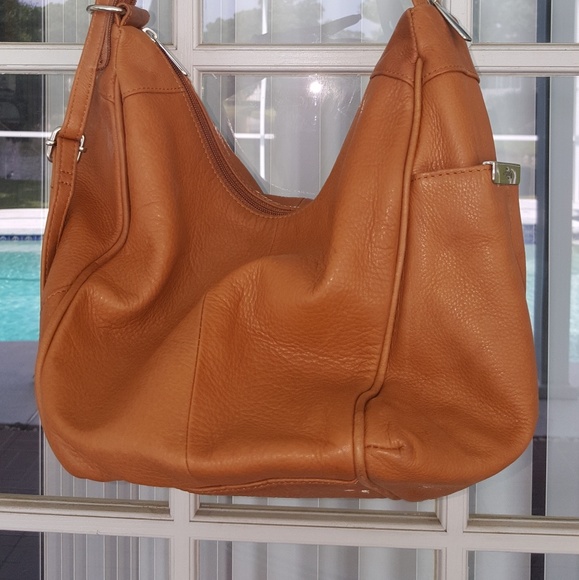 Fossil Handbags - Fossil convertible sling back bag.